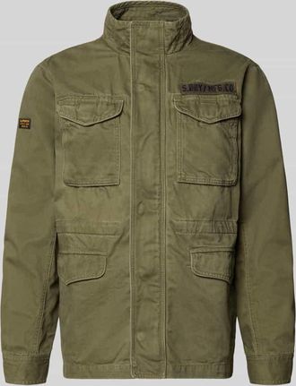 Superdry Military Jacket mit Pattentaschen und Label-Patches in Oliv, Gr&ouml;&szlig;e XXXL
