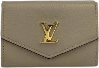 Louis Vuitton Pre-owned Portefeuille Lock Mini Portemonnee - Heren - Vintage Accessoires - Beige - ONE Size - Leer - Vintage