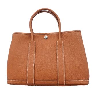 Herm&egrave;s Gold Negonda Leather Tote Bag (Pre-Owned)