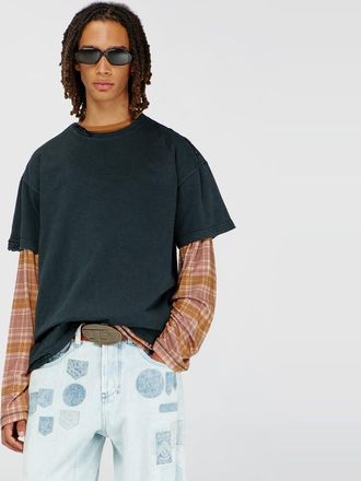 Diesel T-shirt with frayed edges and crystal details - T-Shirts - Man - Black