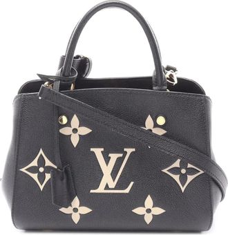 Louis Vuitton Borsa a tracolla Montaigne BB bicolore in pelle Monogram Empreinte Giant 2021-2025 - Nero