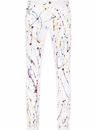 Dolce & Gabbana paint-splatter detail skinny jeans - men - Cotton/Spandex/Elastane - 52 - White