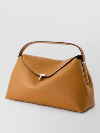 Toteme leather t-lock clutch bag