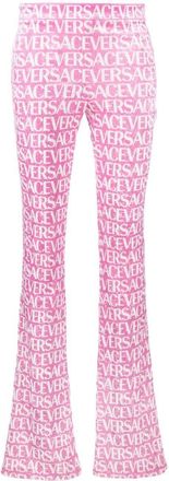 Versace logo-print flared trousers - women - Elastane/Polyester - 36 - Pink