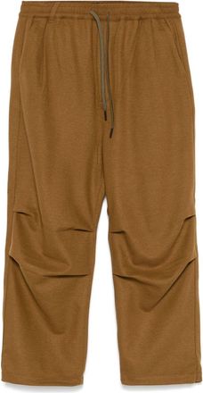 White Mountaineering Pantaloni con pieghe al ginocchio - Marrone