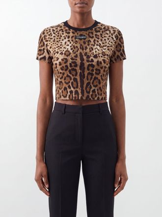 Dolce & Gabbana T-shirt cropped in cotone con stampa animalier e logo