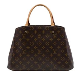 Louis Vuitton Pre-owned Montaigne MM - Dames - Pre-owned - Bruin - Maat: ONE Size Leer