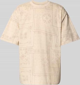Karl Kani T-Shirt mit Label-Stitching in Beige, Größe XXL