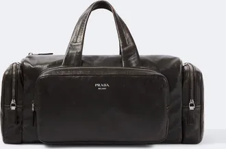 Prada Distressed leather duffel bag