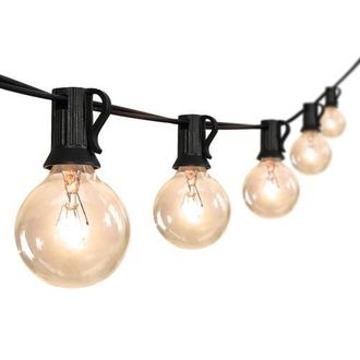 Jonathan Y Designs 25-Light Indoor/Outdoor 25 ft. Contemporary Rustic Incandescent G40 Bistro Globe Bulb String Lights in Black at Nordstrom