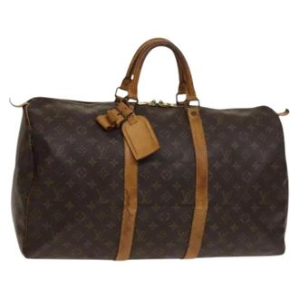 Louis Vuitton Tweedehands Canvas Louis Vuitton tassen - Dames - Pre-owned - Bruin - Maat: ONE Size Leer