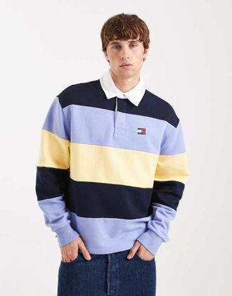 Tommy Jeans Maglione vestibilità comoda stile rugby con bandierina del logo a righe blu navy / lilla /giallo