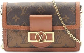 Louis Vuitton 2021-2025 Monogram Reverse Dauphine Wallet on Chain crossbody bag - Brown