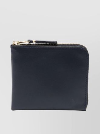 Comme Des Garçons streamlined leather line with smooth finish