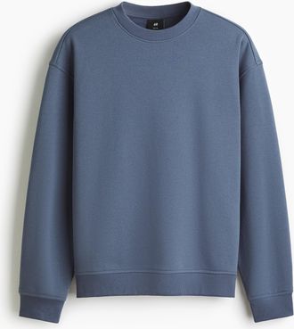 H&M Sweatshirt in Loose Fit - Blue