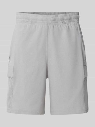 Under Armour Regular Fit Sportshorts mit Cargotasche Modell Unstoppable Airvent in Mittelgrau, Gr&ouml;&szlig;e XXL