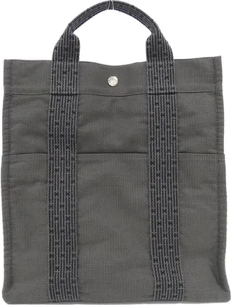 Herm&egrave;s Her Line Black Canvas Backpack (Pre-Owned)