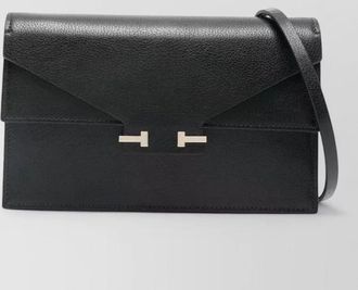 Tom Ford mini clutch bag on shoulder strap