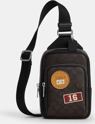 Coach Racer Sling Pack In Signature Canvas With Patches