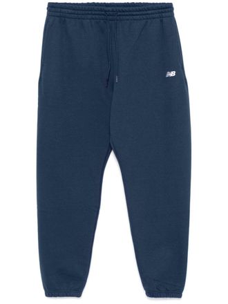 New Balance logo-embroidered track pants - men - Recycled Polyester/Cotton - L - Blue
