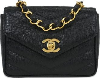 Chanel Borsa a spalla con motivo chevron e battente 1995 - Nero