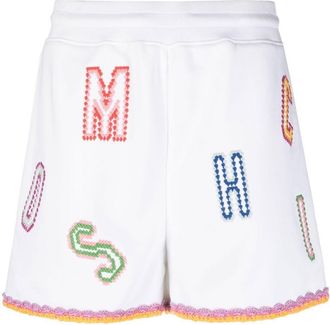Moschino logo-embroidered lace-trim shorts - women - Cotton - 38 - White