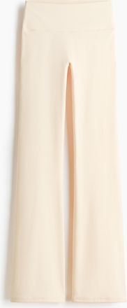 H&M Ausgestellte Yogaleggings mit SoftMove - Orange