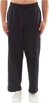 Yohji Yamamoto Zwarte losse trackpants met 3 strepen - Heren - Sweatpants - Zwart - M - Broeken