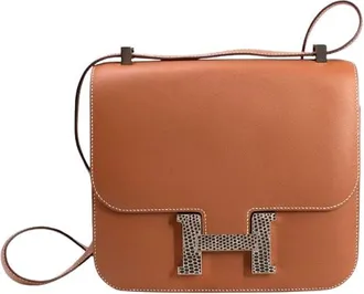 Herm&egrave;s Herm&egrave;s Constance 24 in Gold Madame Leather with Palladium Lizard Hardware