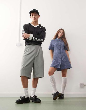 Dr. Martens Adrian tassel loafers in black polished smooth leather