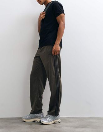 adidas Originals pantaloni della tuta Firebird in kaki scuro-Marrone