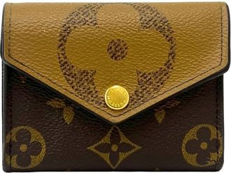 Louis Vuitton Brown Leather Wallet (Tri-Fold) (Pre-Owned)