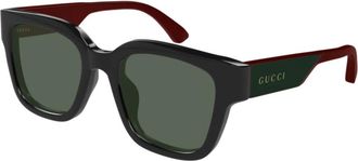 Gucci Stijlvolle zonnebril met een twist - unisex - Accessoires - Zwart - Maat: 52 MM