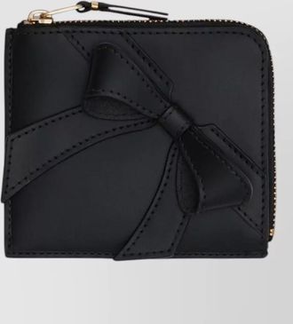 Comme Des Garçons chic purses and cardholders with bow detail