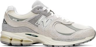 New Balance 2002 - Sneakers in bianco sporco e grigio