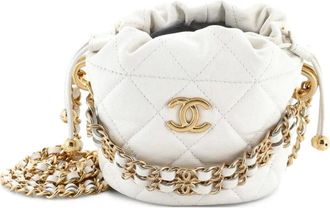 Chanel Medallion Charms Drawstring Bucket Bag Quilted Caviar Mini crossbody bag - Wit