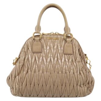 Miu Miu Convertible Dome Satchel Matelasse Leather Beige Leather Handbag (Pre-Owned)
