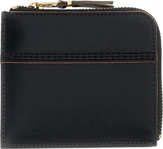 Comme Des Gar&ccedil;ons Triple Stitch portfolio