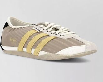 adidas leather paneled low-top sneakers