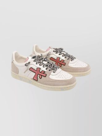 Premiata contemporary low top sneakers with unique features