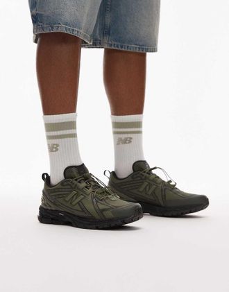 New Balance 1906 - Sneakers verde oliva e nere con fermacorda