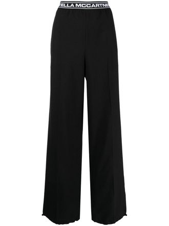 Stella McCartney logo-waistband wide-leg trousers - women - Wool - 50 - Black