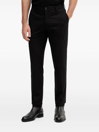 Liu Jo button-fastening trousers - men - Fabric - 52 - Black