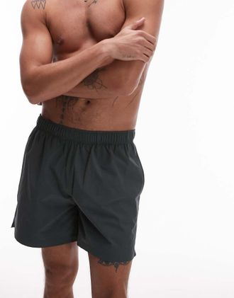 Arket swim shorts in dark green