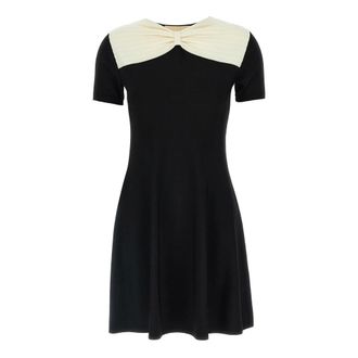 Valentino Garavani Kleedjes, Dames, Zwart, M, Polyester, Mini-jurk van stretch-gebreide stof met strikdetail in twee kleuren