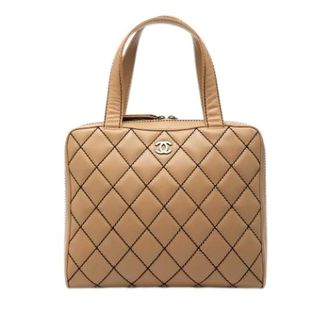 Chanel Pre-owned Handbags, female, Beige, Size: ONE SIZE Pre-owned Quilted Lambskin Handbag