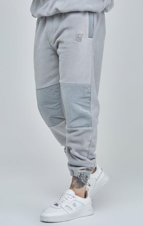 Siksilk Jogger con paneles de forro polar y pu&ntilde;o gris para hombre SikSilk M