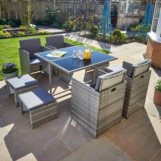 Home Source Industries 9 Piece Rattan Garden Furniture Set 4 Chairs 4 Footstool Chairs Table in Grey