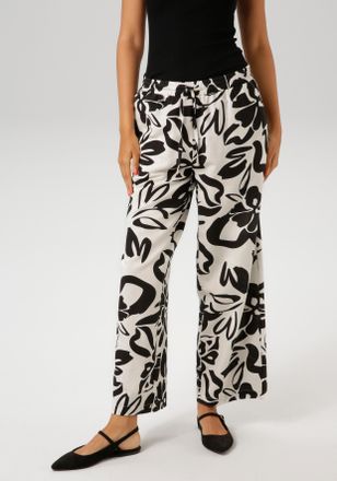 Aniston Schlupfhose mit grossflächigen Blättern bedruckt