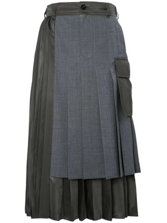 sacai Layered Pleated Skirt with Tailored Design and Flap Pockets